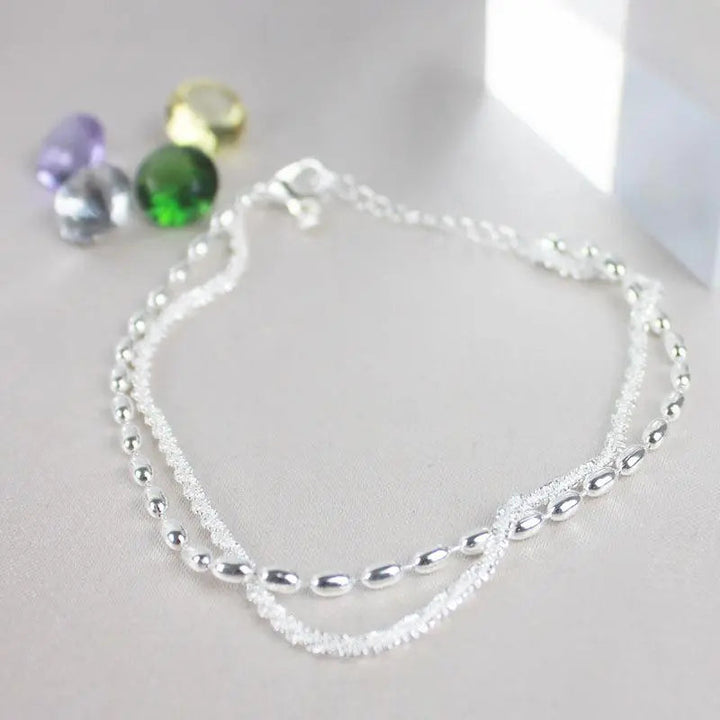 Set di bracciali eleganti in argento con pietre di zirconia