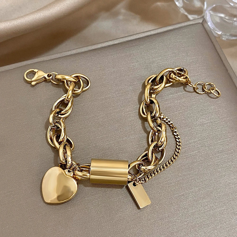 Bracciale spesso a cuore in oro