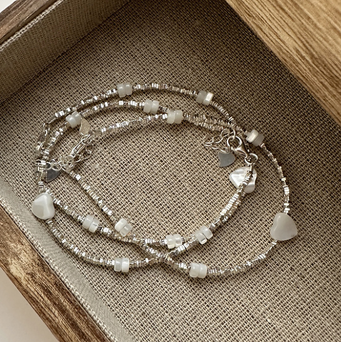 Collezione di bracciali classici vintage con perle